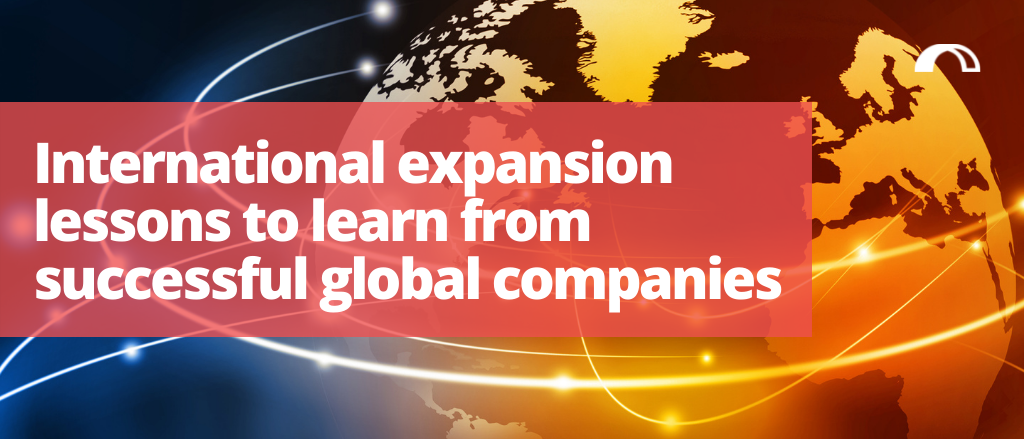 "International expansion lessons to learn from successful global companies" blog title, surrounderd by an image of the world with lines flying around it to signify connection between regions and expansion